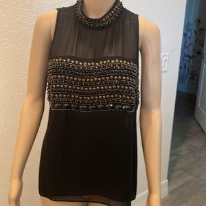 Beaded top with tails
